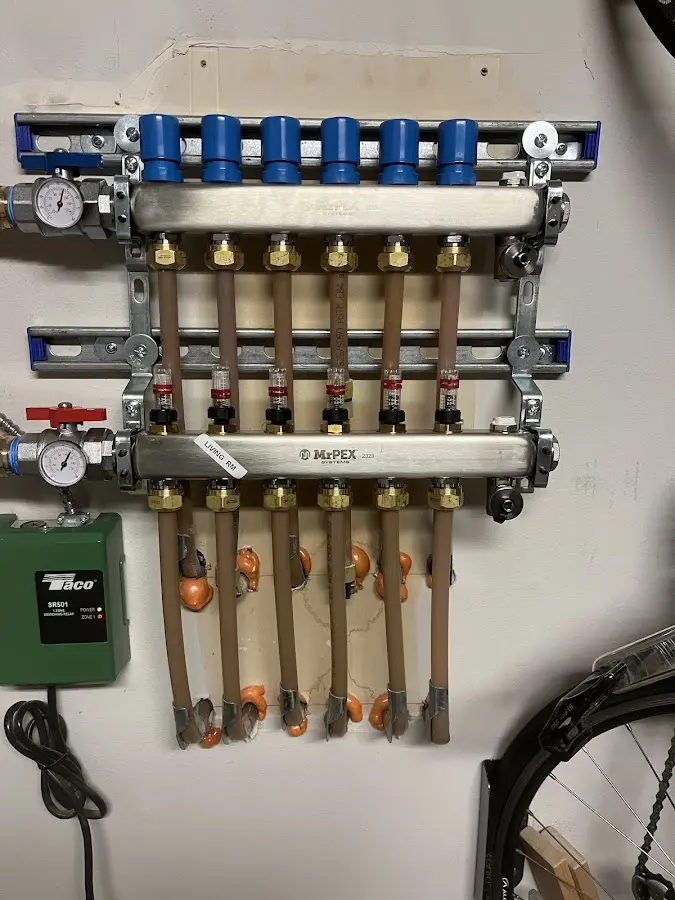 Plumber performing Water Heater Repair at a residential property in Arvada